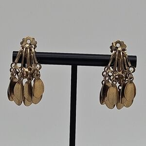 vintage gold tone clip on earrings with oval shaped dangles